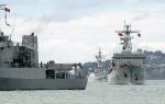 ID 6432 HMNZS WELLINGTON (P55) - one of the New Zealand Navy's two offshore patrol vessels breaks off her escort of the PLAN ZHENGHE (right) a training ship of the Peoples Liberation Army Navy and the guided...